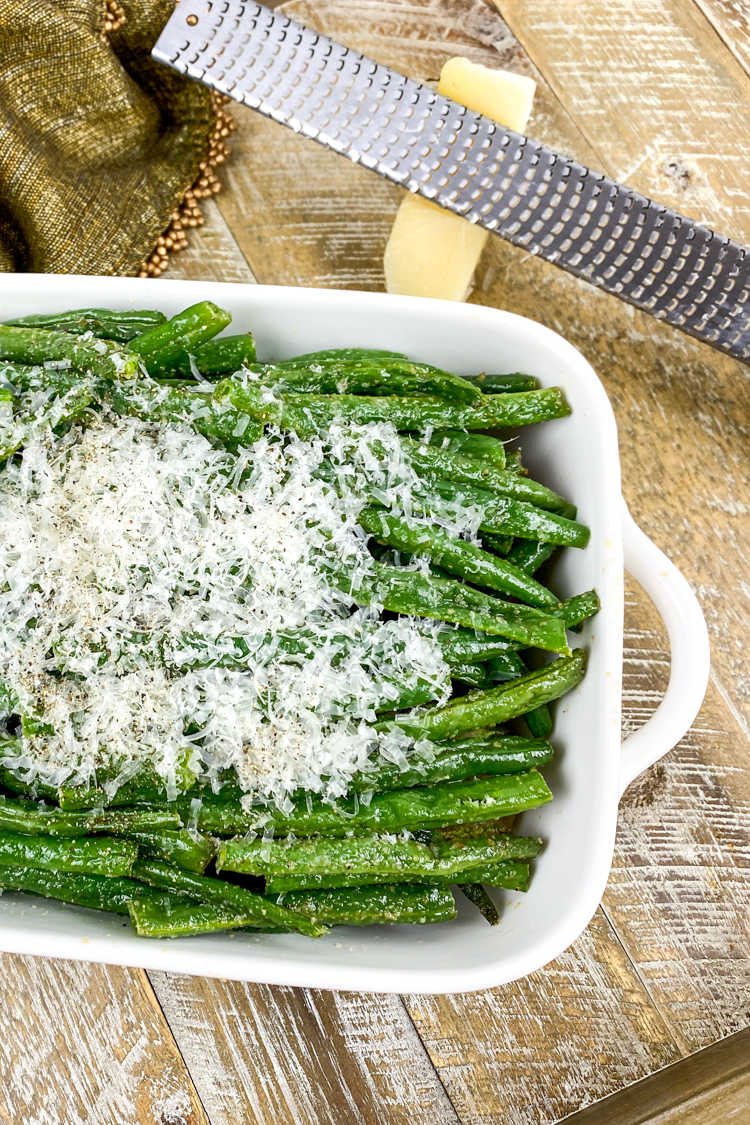Make these oven roasted green beans topped generously with Parmesan, when you want a classic dish that feels special. 