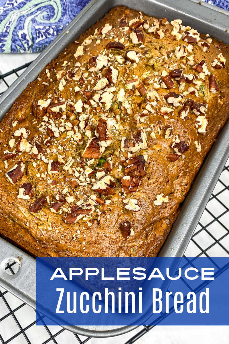 This delicious applesauce zucchini bread has pecans mixed in and on top, so you will want to bake and eat it often. 