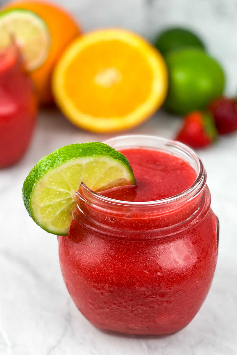 This virgin strawberry frozen margarita recipe is deliciously refreshing for the whole family, since it doesn't contain alcohol.