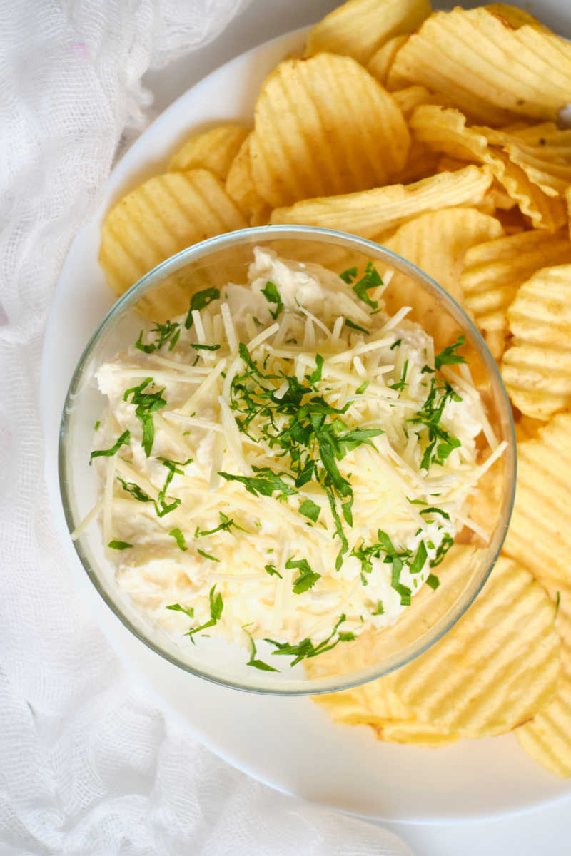 Enjoy this delicious garlic parmesan chip dip, when you are having a party, watching a movie with your family or just because.
