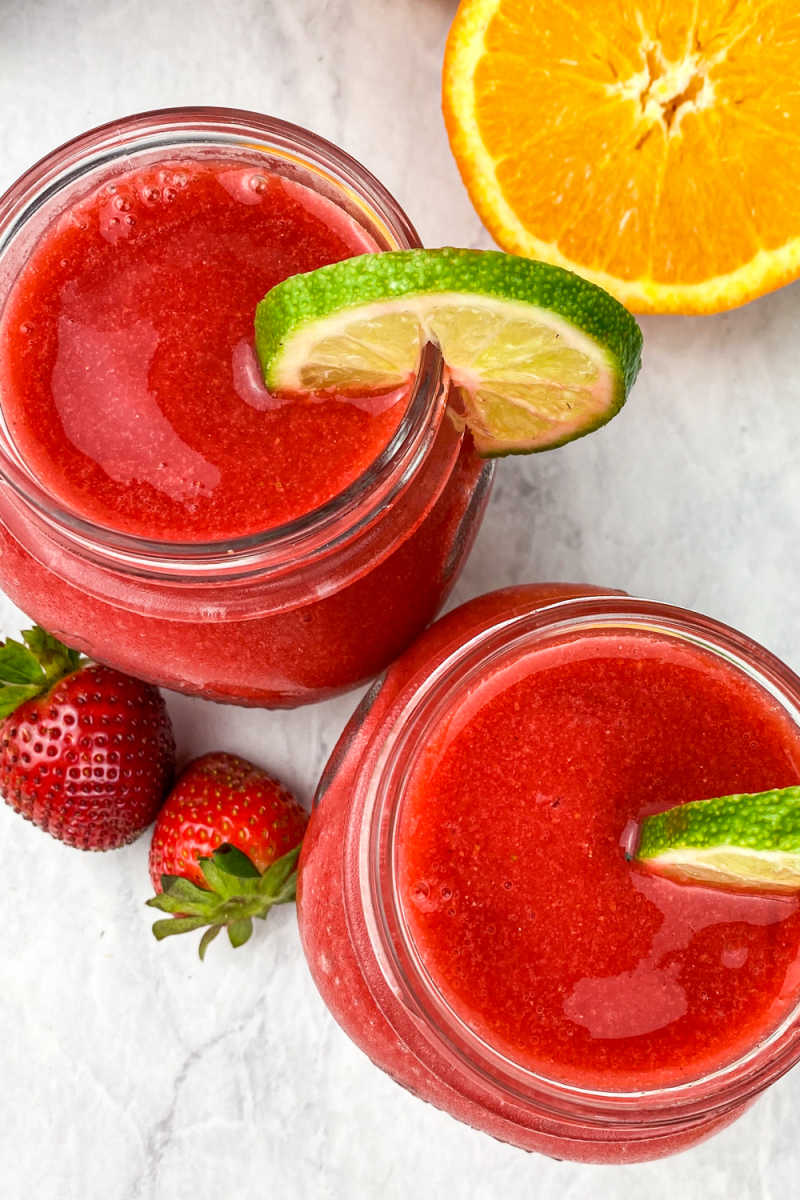 This virgin strawberry frozen margarita recipe is deliciously refreshing for the whole family, since it doesn't contain alcohol.