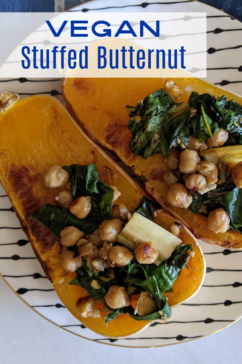 This vegan stuffed butternut squash is roasted is filled with a flavorful mix of chard and chickpeas, so it is delicious.