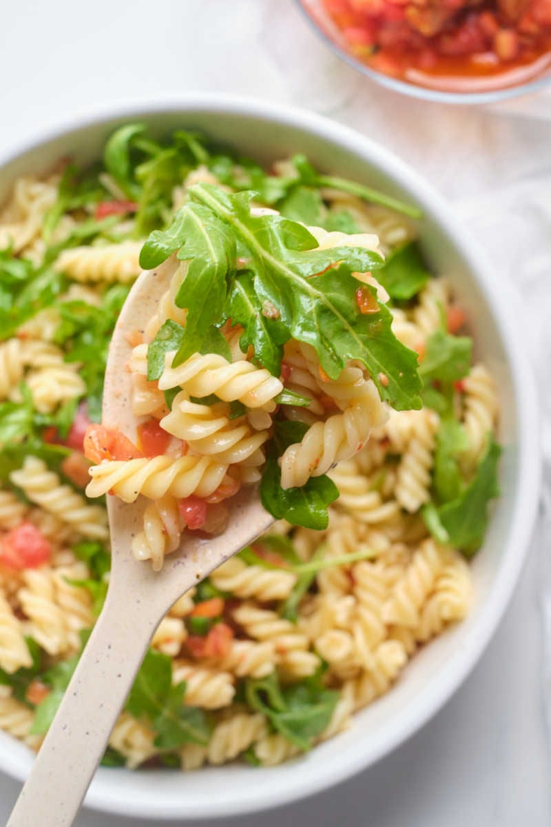 Here is an easy bruschetta pasta salad that always gets rave reviews, even though it takes minimal effort to make it.