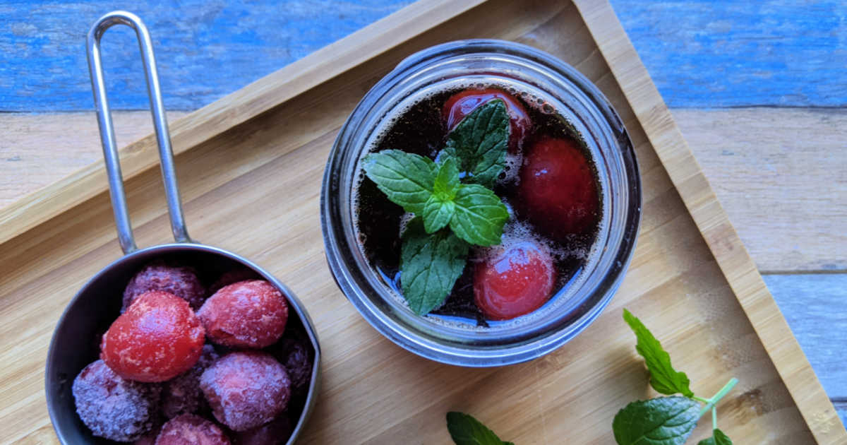 bourbon and coke with cherries