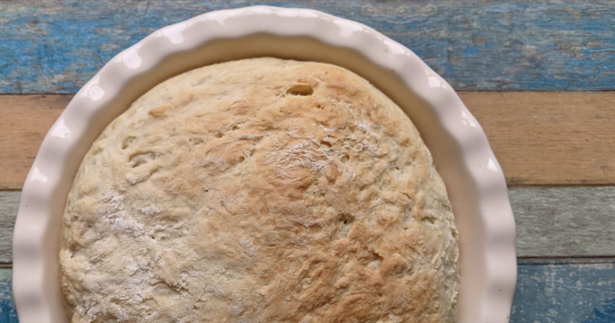 whole loaf of bread baked in a pie dish
