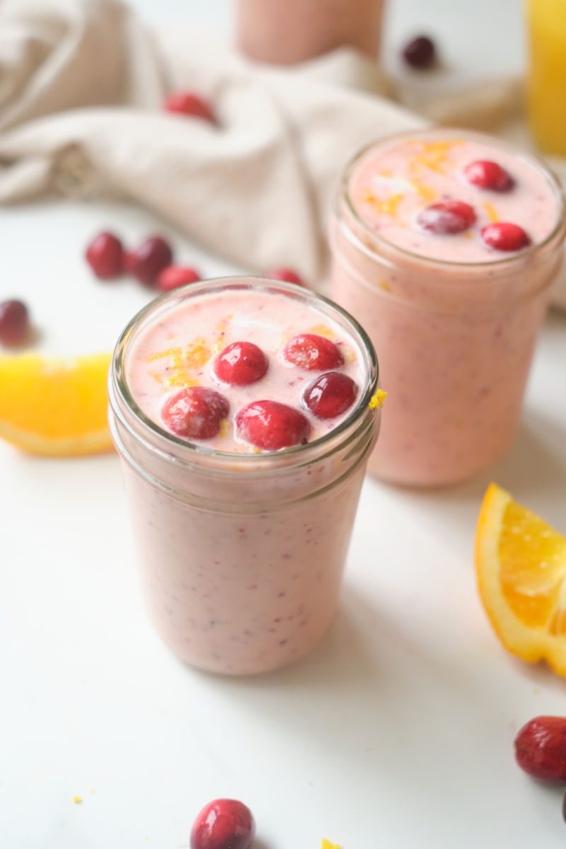 A creamy cranberry orange smoothie is a great way to start your day. It’s packed with fruit and flavored with a touch of honey and cinnamon.