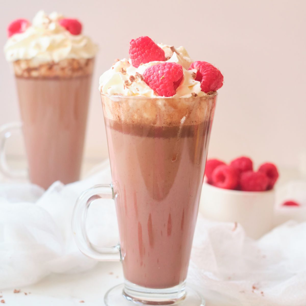 glass mugs with raspberry hot cocoa