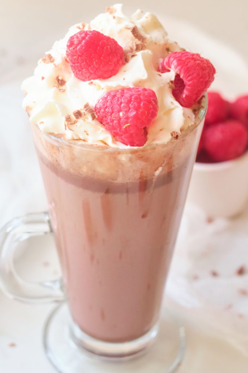 Learn how to make this delicious milk chocolate raspberry hot cocoa recipe. The warm chocolate drink is the perfect way to warm up on a cold winter day.