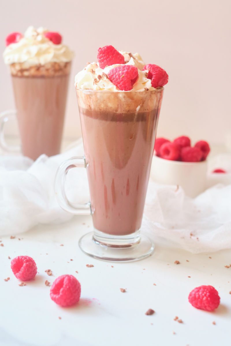 Learn how to make this delicious milk chocolate raspberry hot cocoa recipe. The warm chocolate drink is the perfect way to warm up on a cold winter day.