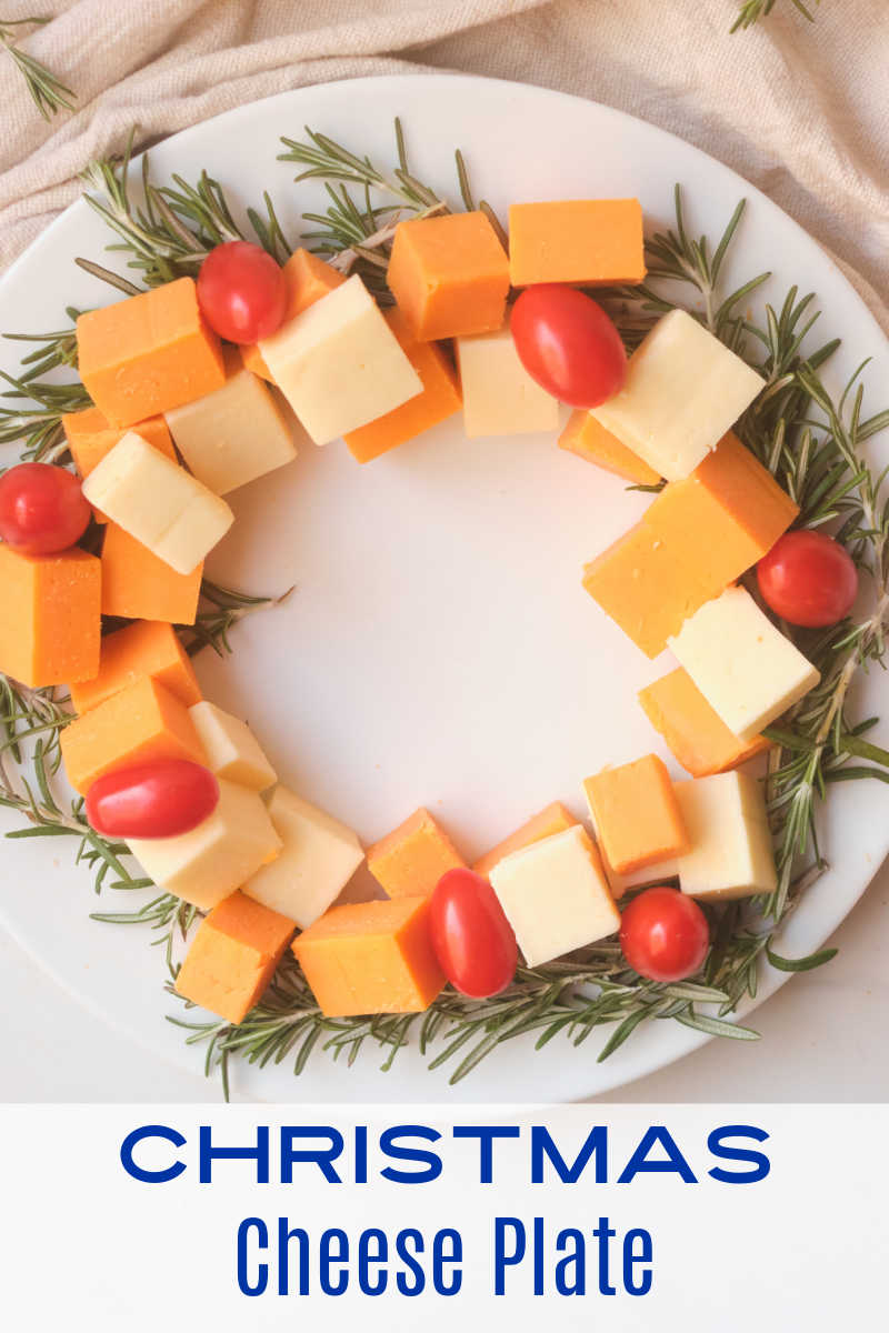 This holiday themed Christmas wreath cheese platter is easy to make and will help make your holiday table look festive. 