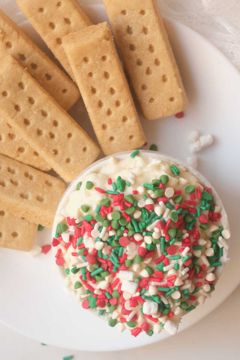 Festive Christmas cookie dip is a wonderful dessert treat, when it is topped with red and green sprinkles for the holidays. 