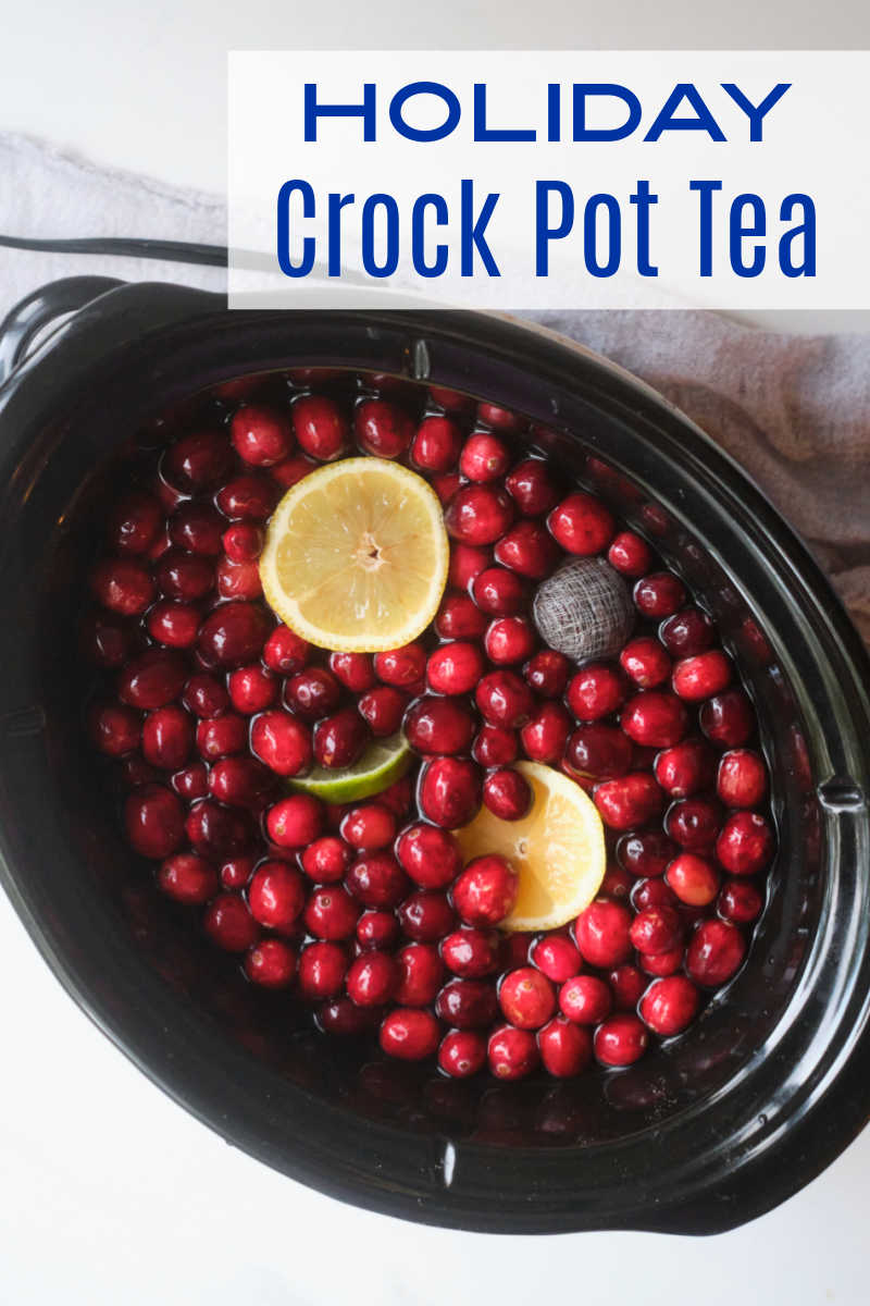 Holiday Crock Pot tea tastes amazing, when you simmer black tea, cranberries, raspberries and citrus fruit in your slow cooker. 