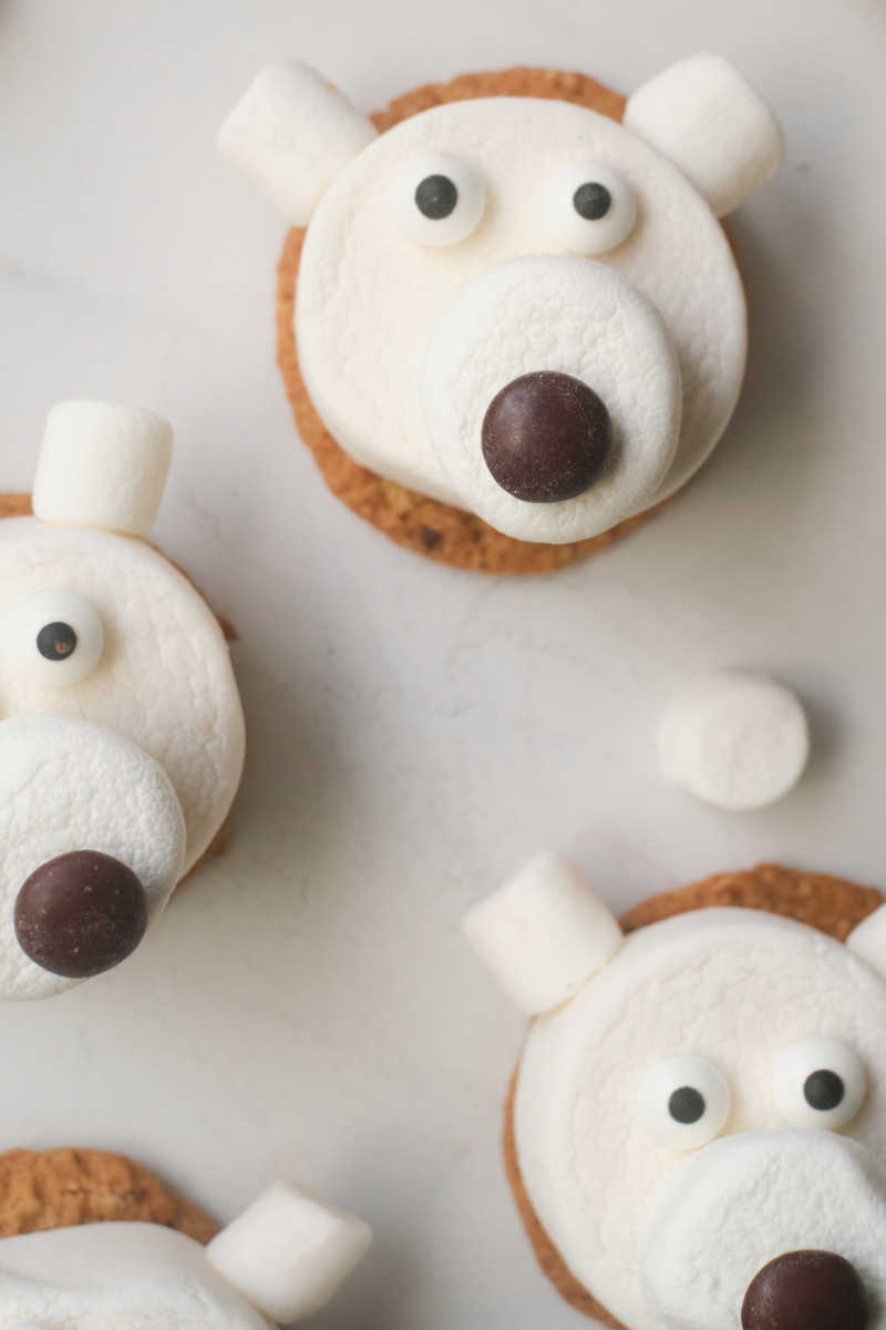 These polar bear cookies are fun to make with oatmeal cookies, marshmallows and candy, so enjoy them for Christmas or anytime.