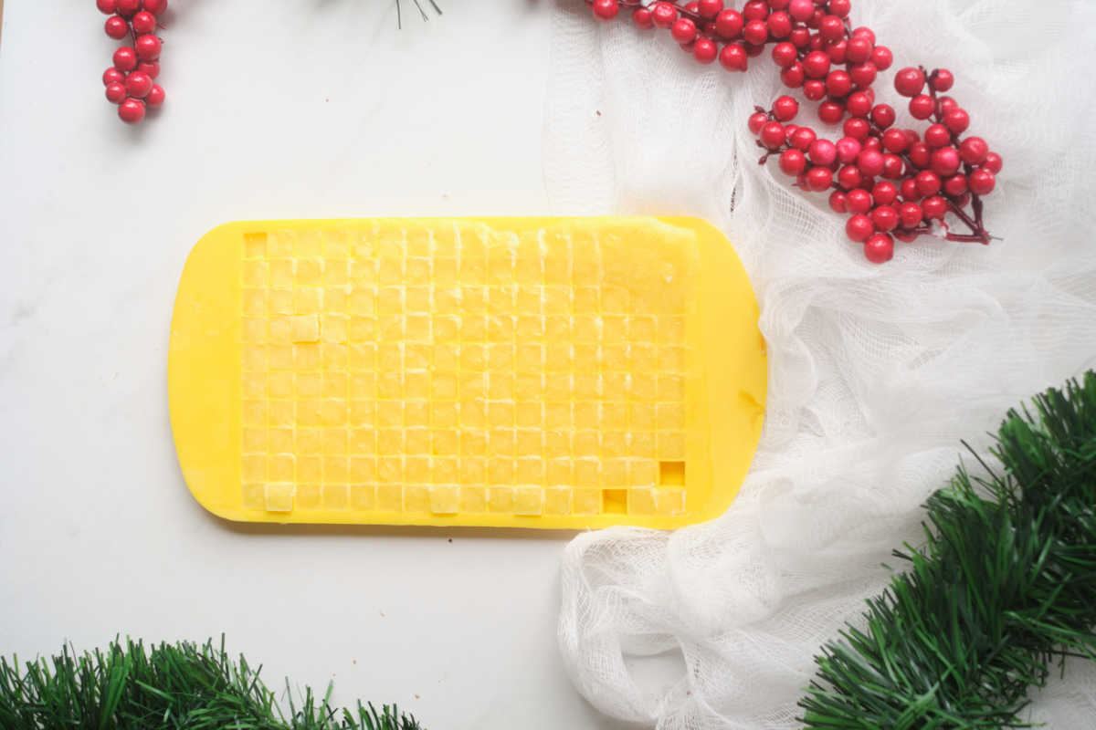 silicone mini ice cube tray filled with eggnog