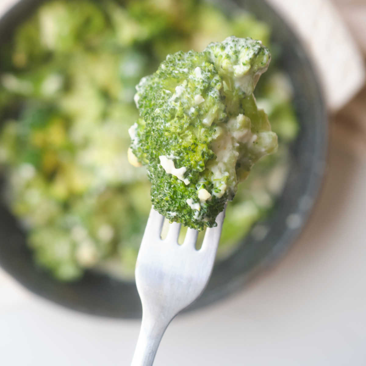 cheese broccoli on fork