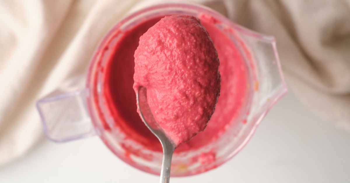 spoon of beet hummus