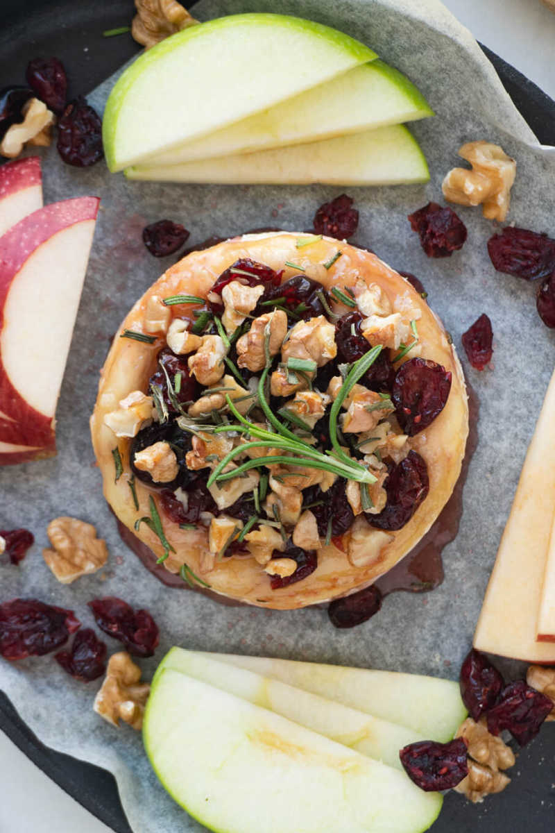 Enjoy this baked brie appetizer topped with cranberries and walnuts, when you want an easy dish that looks and tastes impressive.