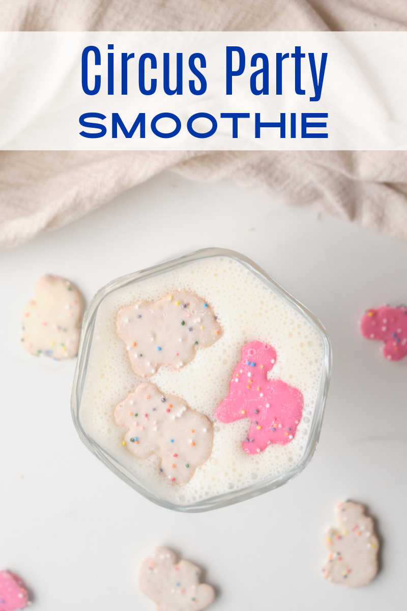 Make any occasion special, when you sip on a fun circus party smoothie topped with pink and white frosted animal cookies. 