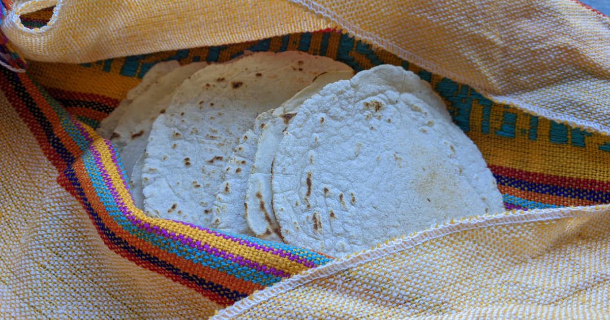 fresh tortillas wrapped in towel