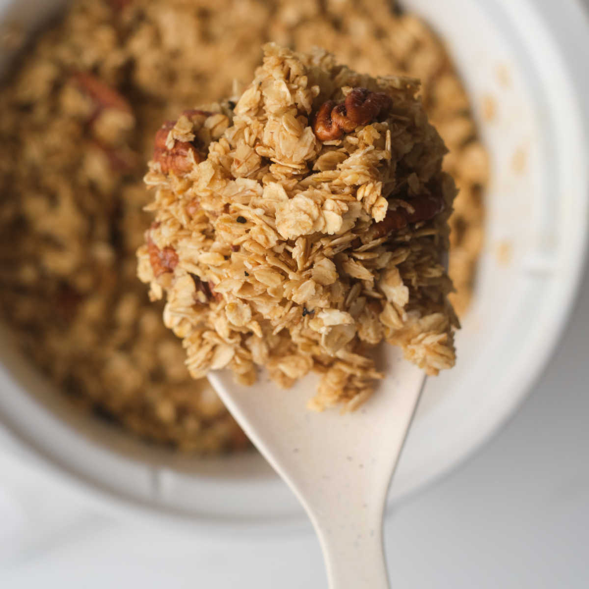 maple pecan granola on spoon