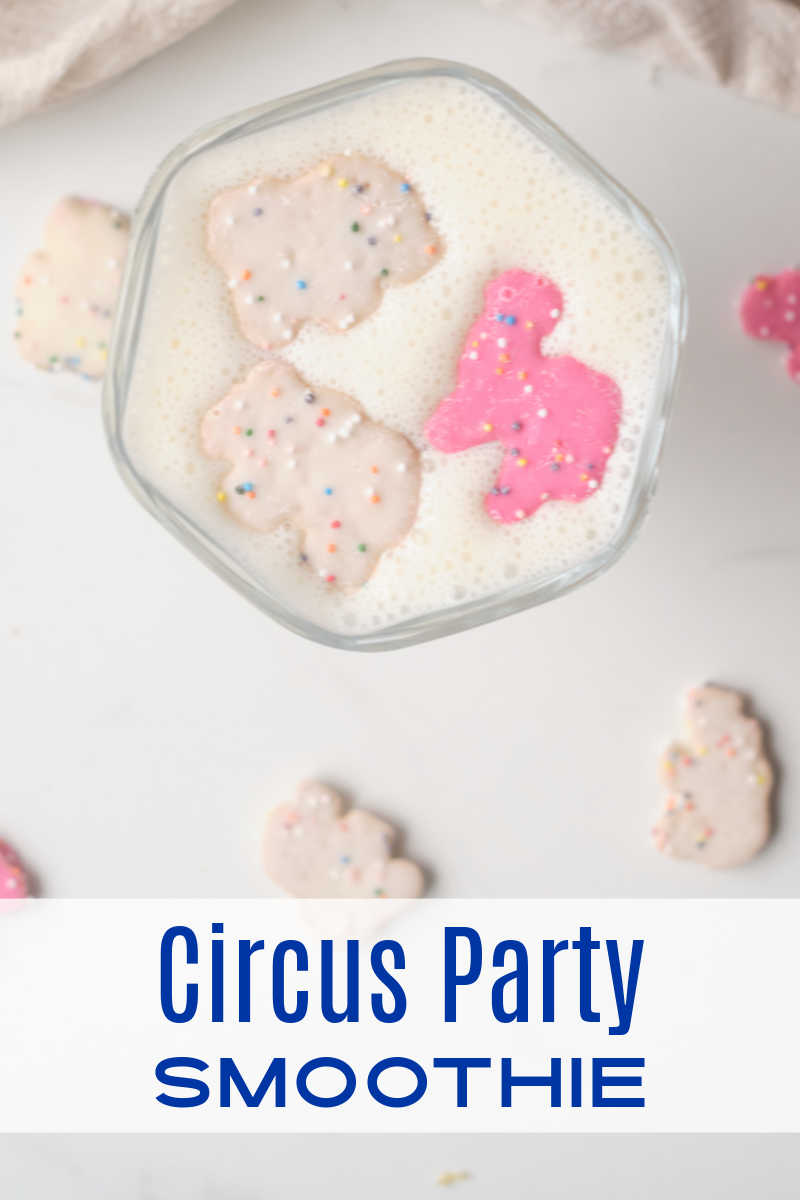 Make any occasion special, when you sip on a fun circus party smoothie topped with pink and white frosted animal cookies. 