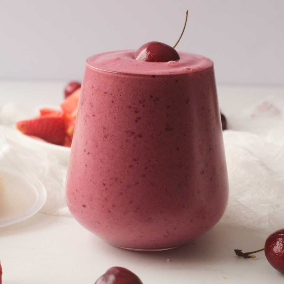 smoothie with strawberries and cherries