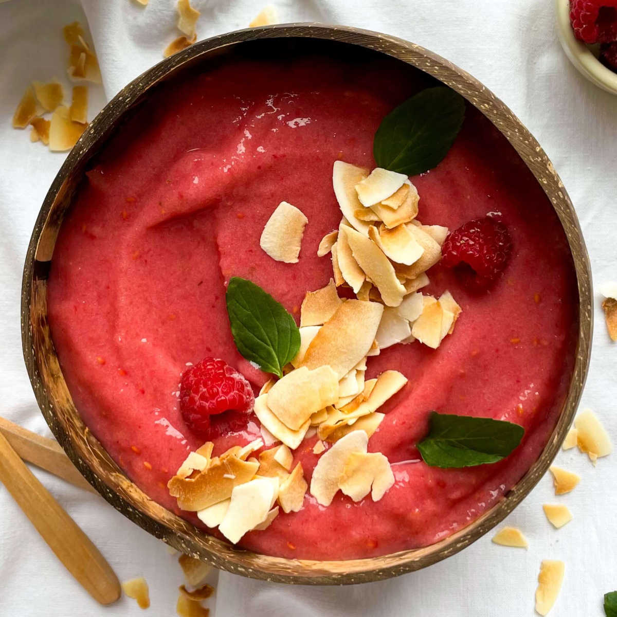 raspberry pineapple smoothie bowl with coconut
