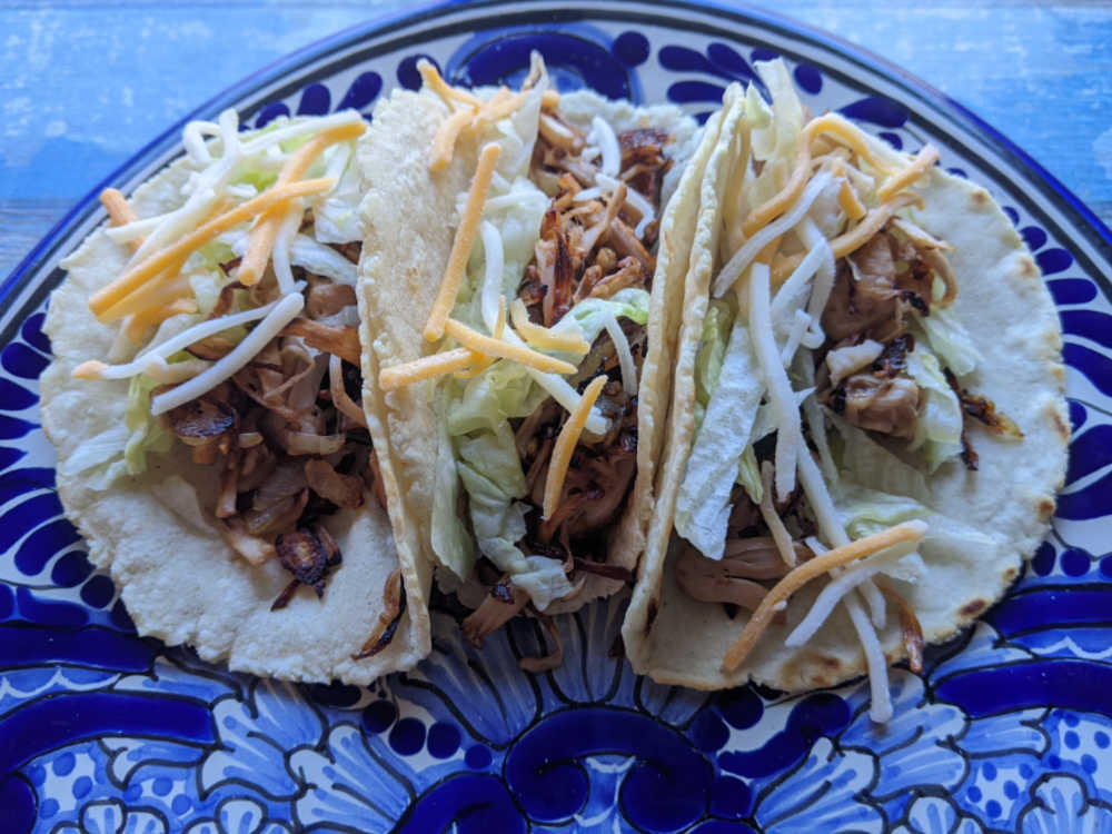 jackfruit tacos with lettuce and cheese