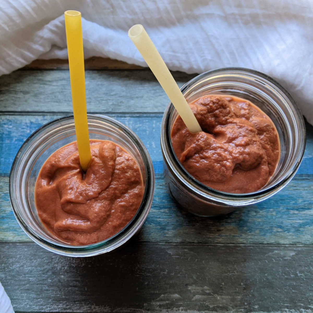 two mamey shakes with rice straws