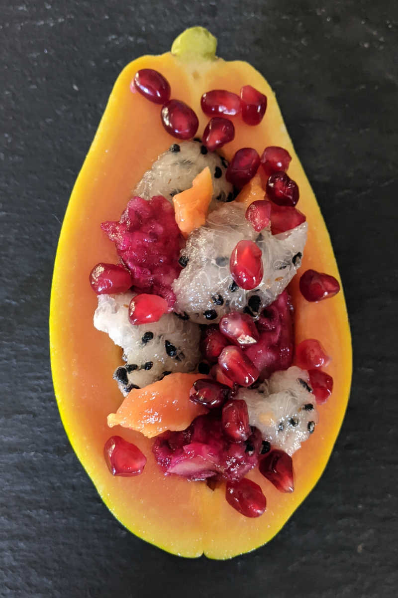 Fruit salads are lovely, but this exotic fruit salad served in a papaya boat takes the appearance and taste to a whole new level. 