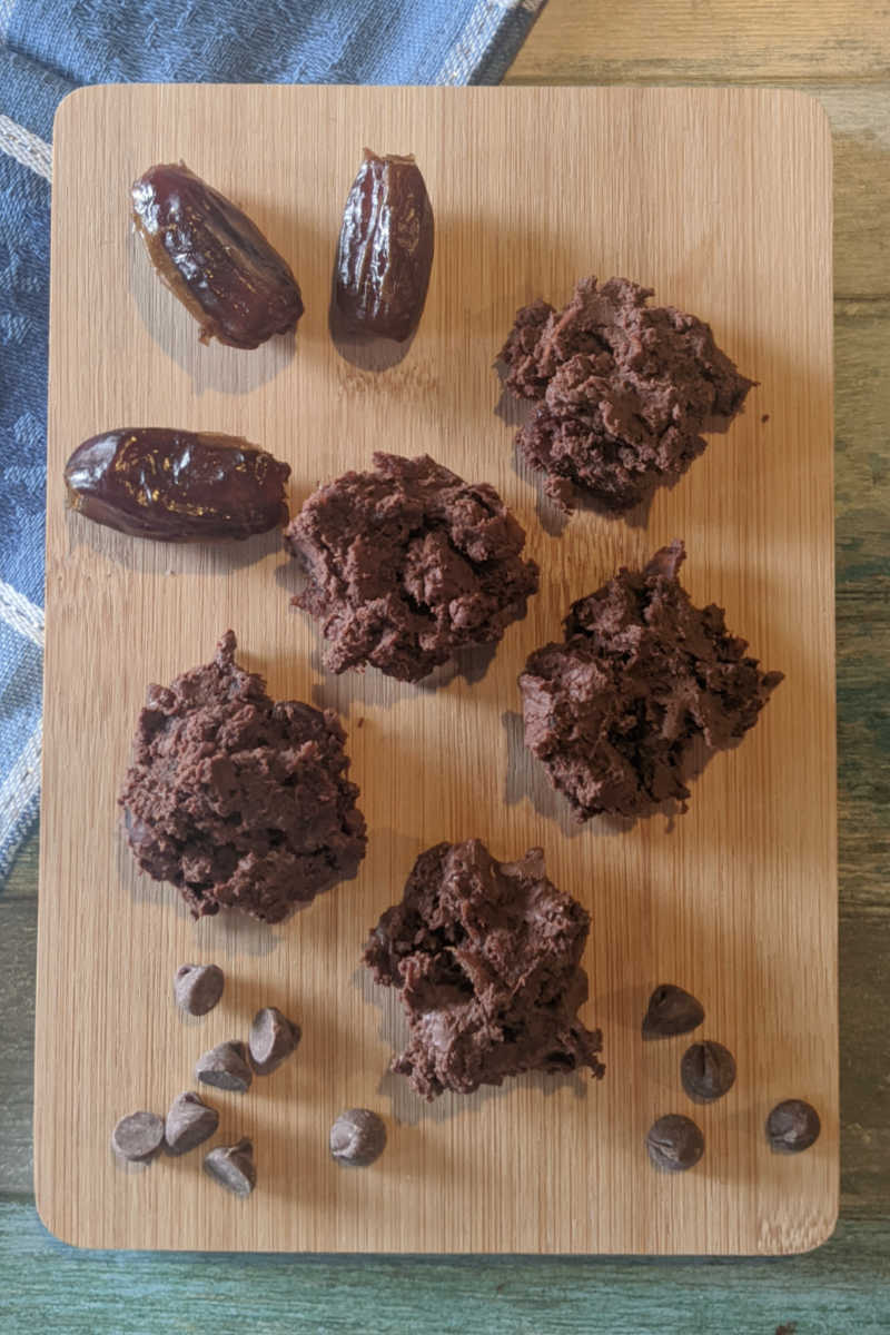 Homemade chocolate date clusters are delicious, and they are easy to make with just two simple ingredients and a microwave oven. 