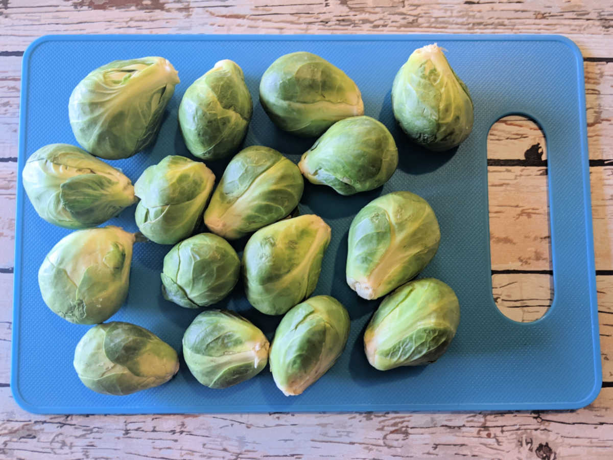 cutting board with brussels sprouts