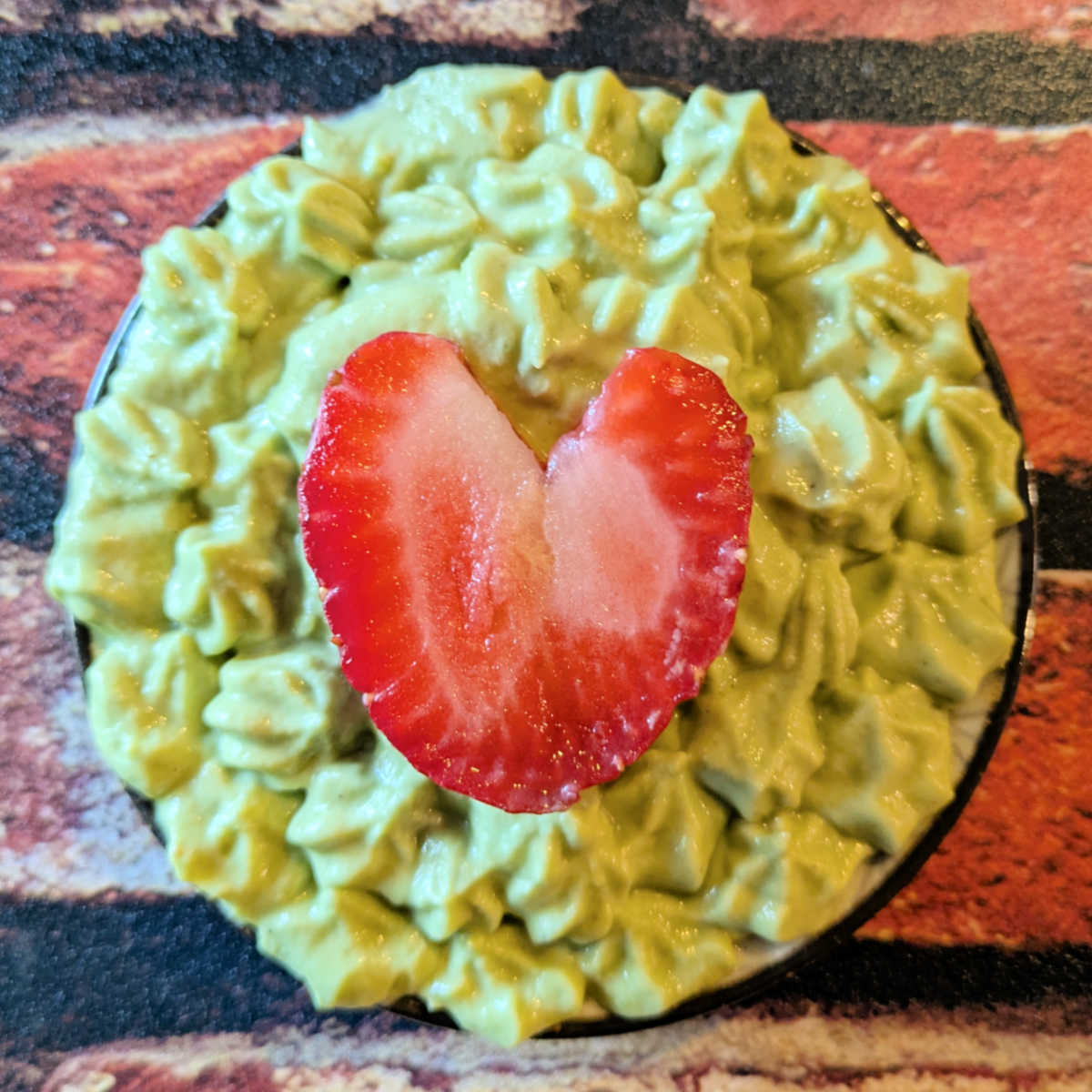 grinch guacamole with strawberry heart