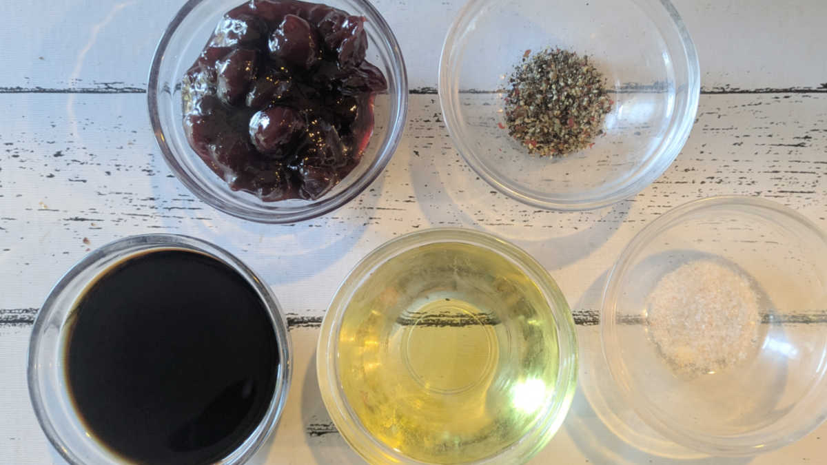 salad dressing ingredients in glass bowls