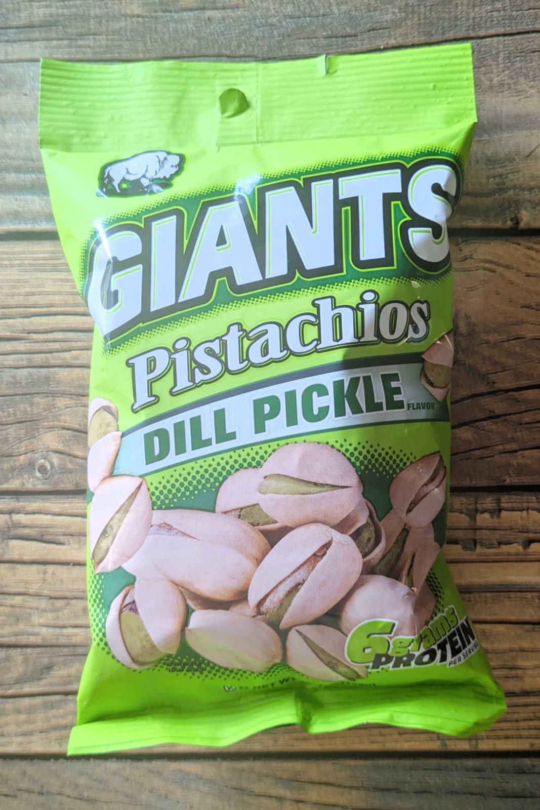 Indulge in the bold taste of Giants Dill Pickle Pistachios for fantastic flavor and 6g protein. They are a delicious, satisfying, not-junk-food snack.
