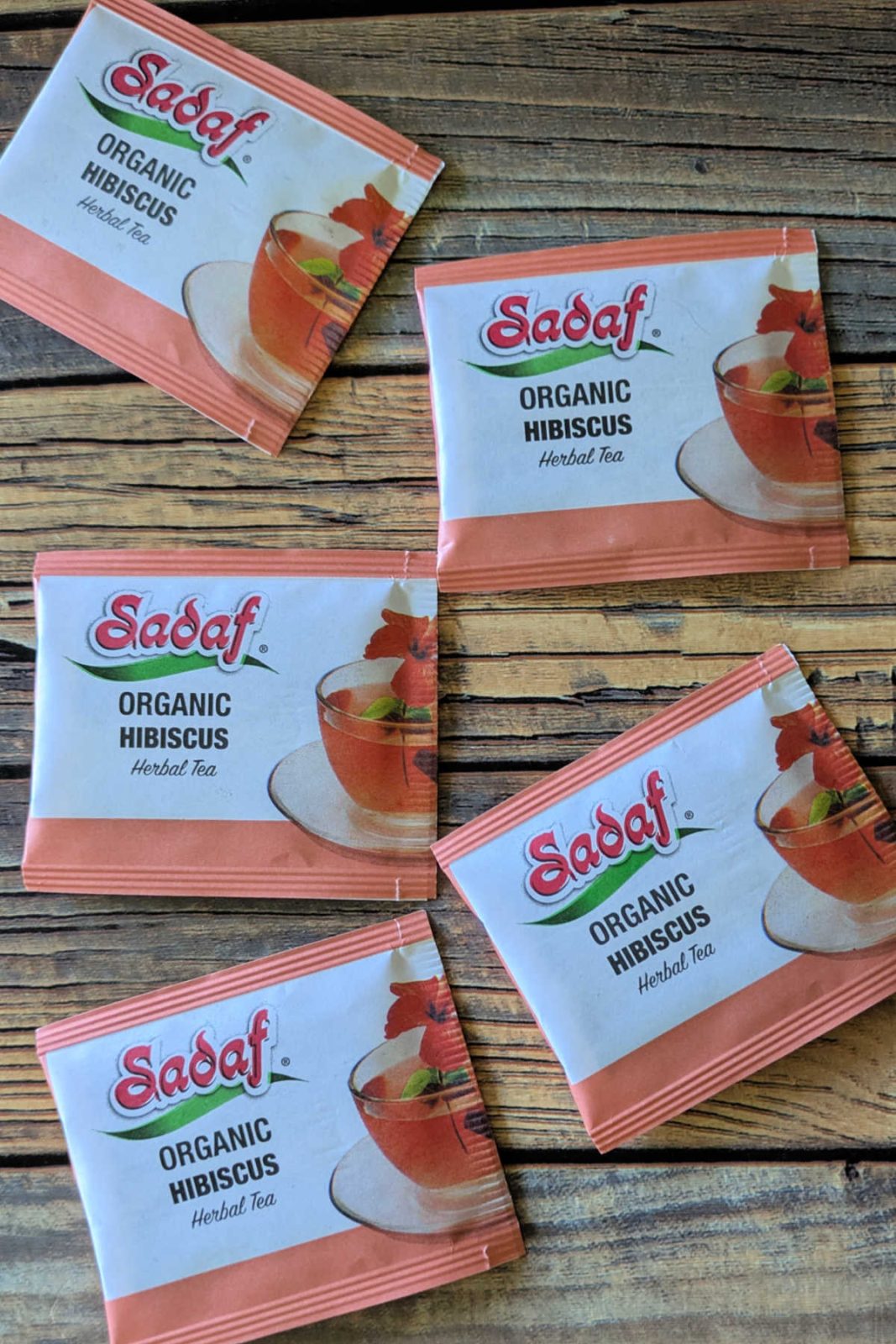 Experience the beautiful color and refreshing taste of Sadaf Organic Hibiscus Tea. It's delicious hot or iced, caffeine-free, and so pretty!