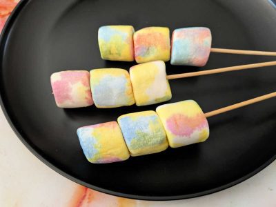 three tie dy marshmallow pops