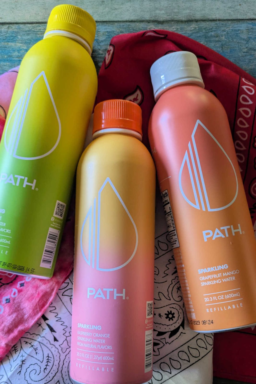 PATH Sparkling Water offers three great zero-calorie, zero-sugar flavors in a durable, reusable aluminum bottle. Try Lemon Lime, Grapefruit Mango, and Raspberry Orange!