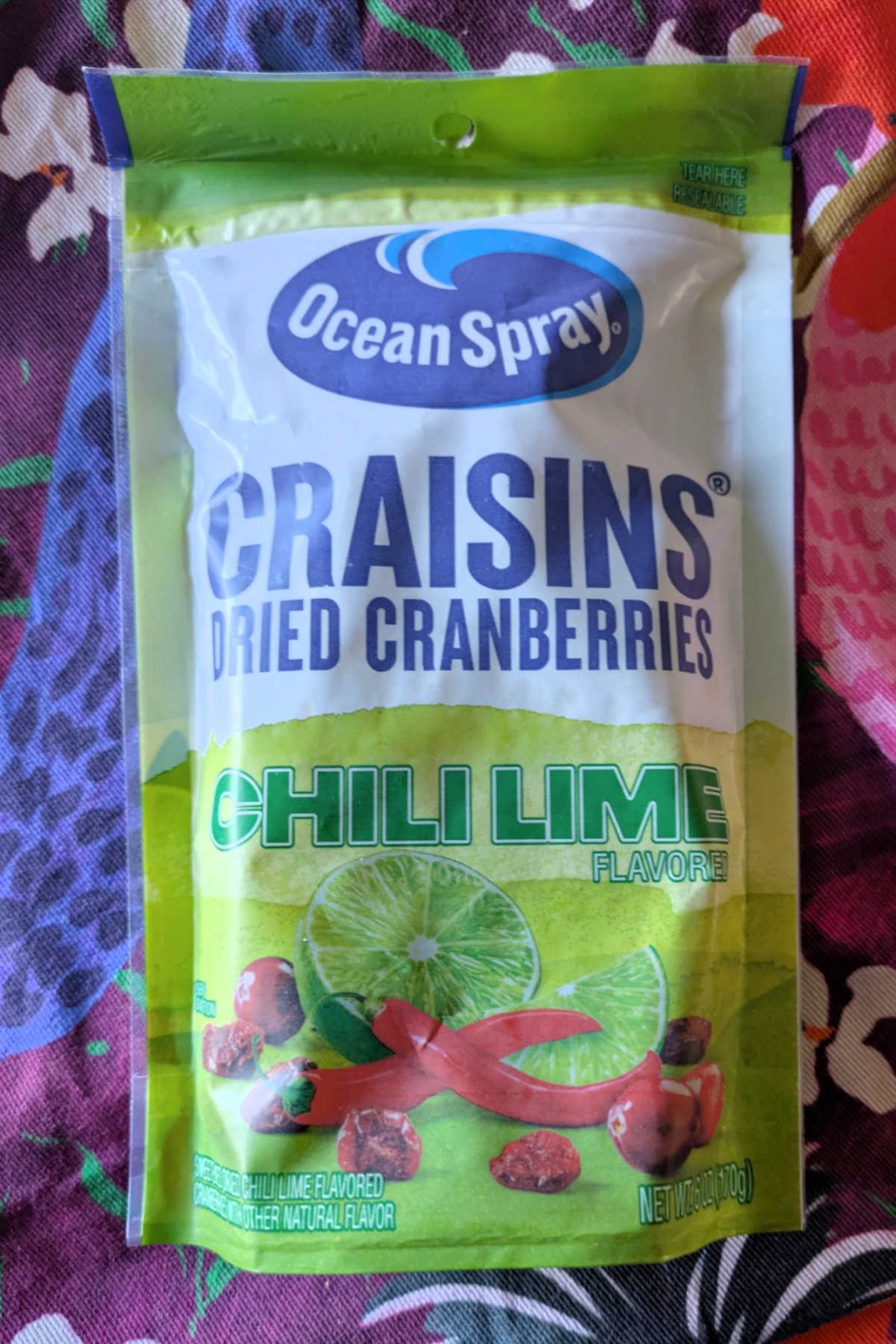 Ocean Spray Chili Lime Craisins are a delicious dried fruit snack with a mild heat. Featuring a good flavor where you can taste the cranberries, lime and chili, these are sweetened with sugar and come in a resealable pouch—great for snacking or adding to salads!